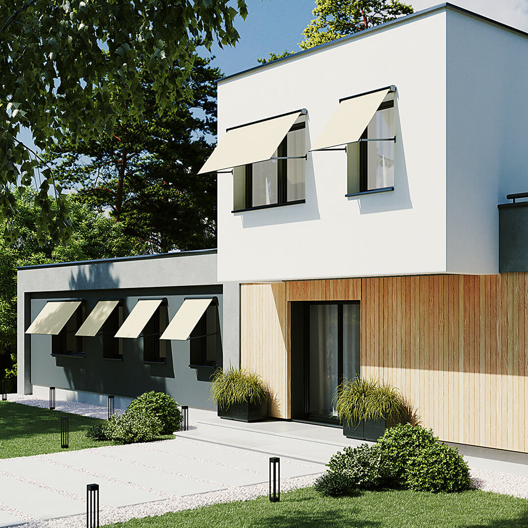 Ljusgula fönstermarkiser över fönster på modern villafasad med entré och trädgård